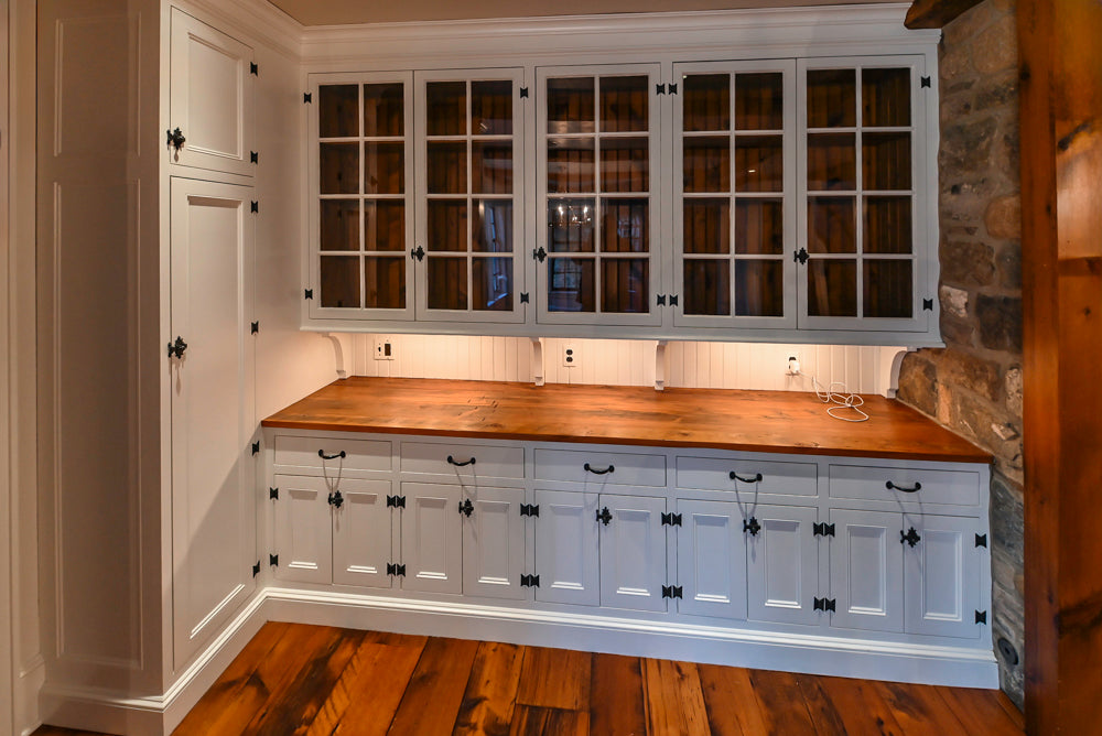Rustic Traditional White & Navy Kitchen with Black AGA Range, Wood Top Island & Soapstone Countertops