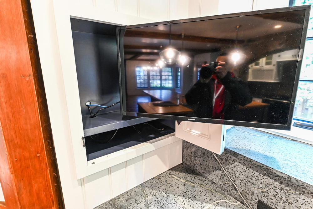 Rustic Traditional White & Navy Kitchen with Black AGA Range, Wood Top Island & Soapstone Countertops