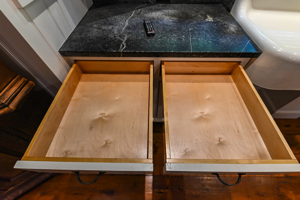 Rustic Traditional White & Navy Kitchen with Black AGA Range, Wood Top Island & Soapstone Countertops