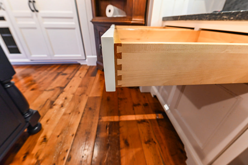 Rustic Traditional White & Navy Kitchen with Black AGA Range, Wood Top Island & Soapstone Countertops