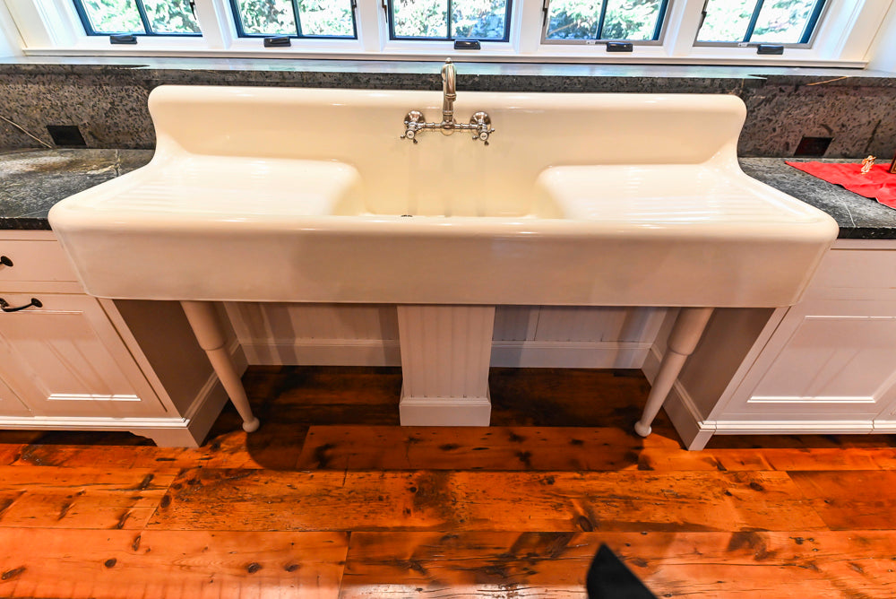 Rustic Traditional White & Navy Kitchen with Black AGA Range, Wood Top Island & Soapstone Countertops