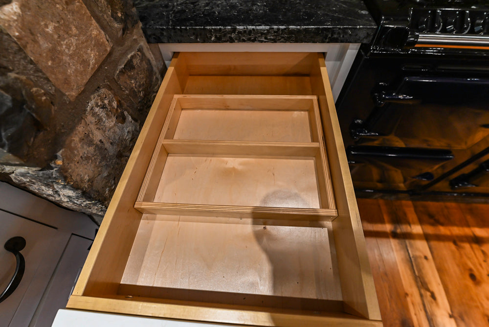 Rustic Traditional White & Navy Kitchen with Black AGA Range, Wood Top Island & Soapstone Countertops