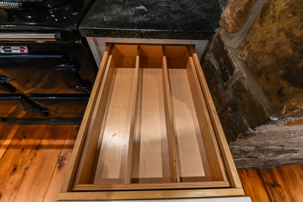 Rustic Traditional White & Navy Kitchen with Black AGA Range, Wood Top Island & Soapstone Countertops