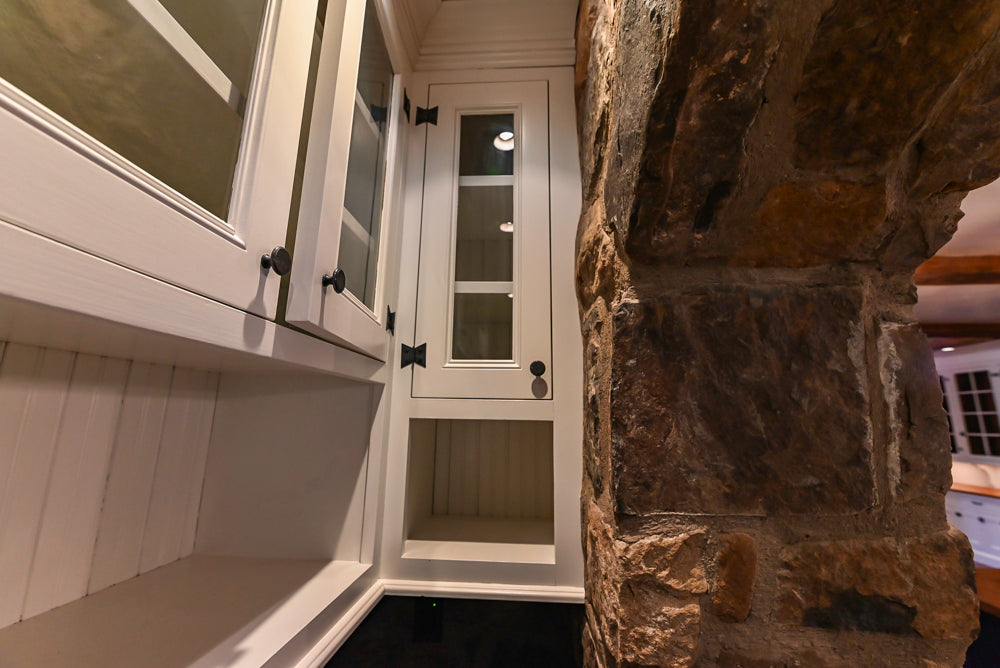Rustic Traditional White & Navy Kitchen with Black AGA Range, Wood Top Island & Soapstone Countertops