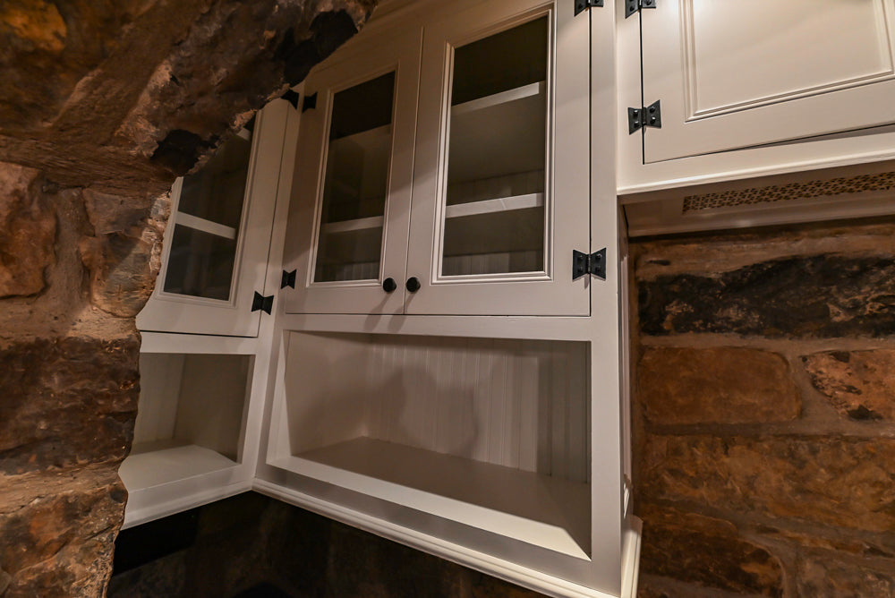 Rustic Traditional White & Navy Kitchen with Black AGA Range, Wood Top Island & Soapstone Countertops