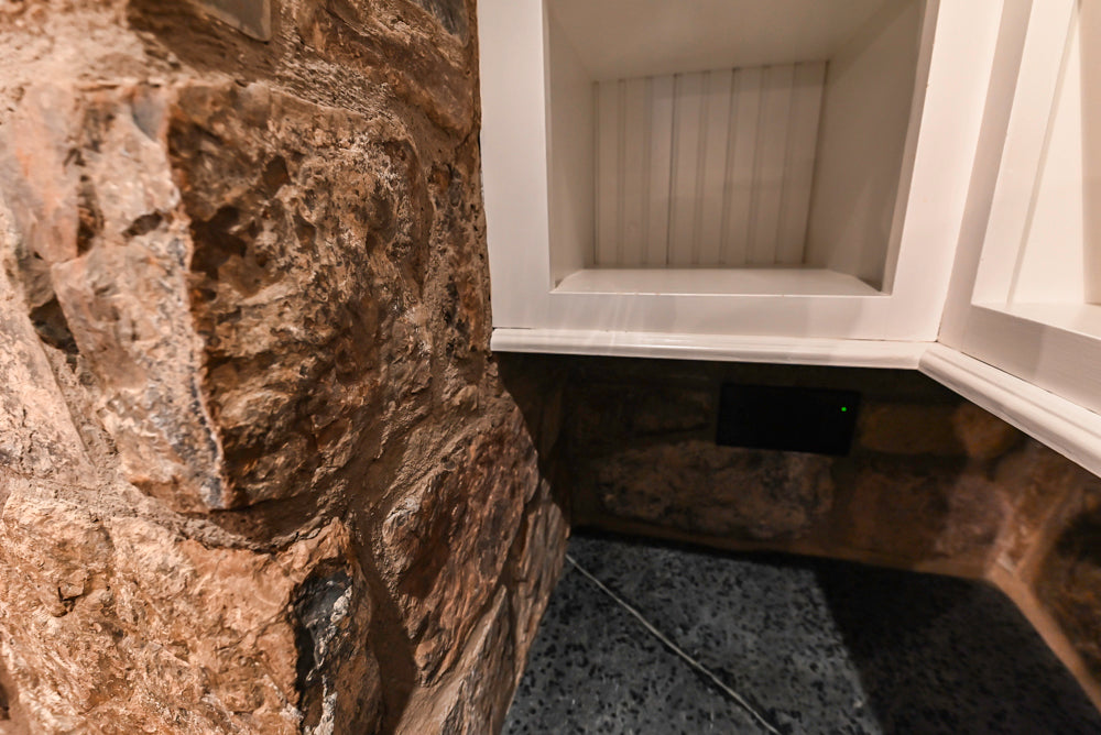 Rustic Traditional White & Navy Kitchen with Black AGA Range, Wood Top Island & Soapstone Countertops