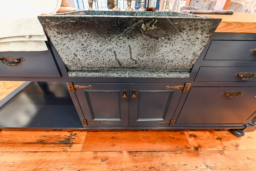 Rustic Traditional White & Navy Kitchen with Black AGA Range, Wood Top Island & Soapstone Countertops