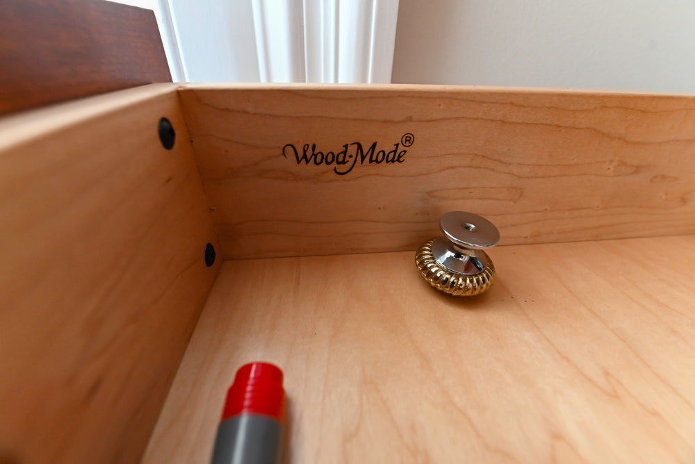 Wood-Mode Traditional Pantry with Dark Granite Countertop & Sub-Zero Refrigerator