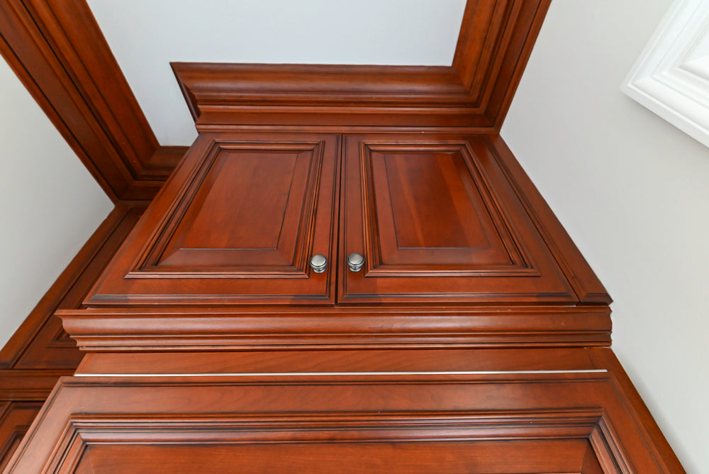 Wood-Mode Traditional Pantry with Dark Granite Countertop & Sub-Zero Refrigerator