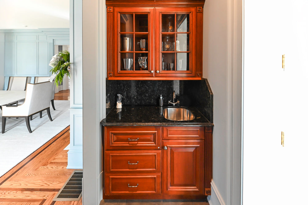 Wood-Mode Traditional Wet Bar with Dark Granite Countertops & Sub-Zero Wine Cooler