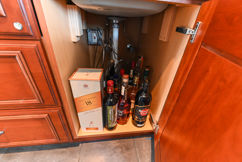 Wood-Mode Traditional Wet Bar with Dark Granite Countertops & Sub-Zero Wine Cooler