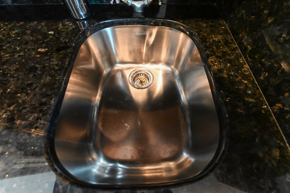 Wood-Mode Traditional Wet Bar with Dark Granite Countertops & Sub-Zero Wine Cooler