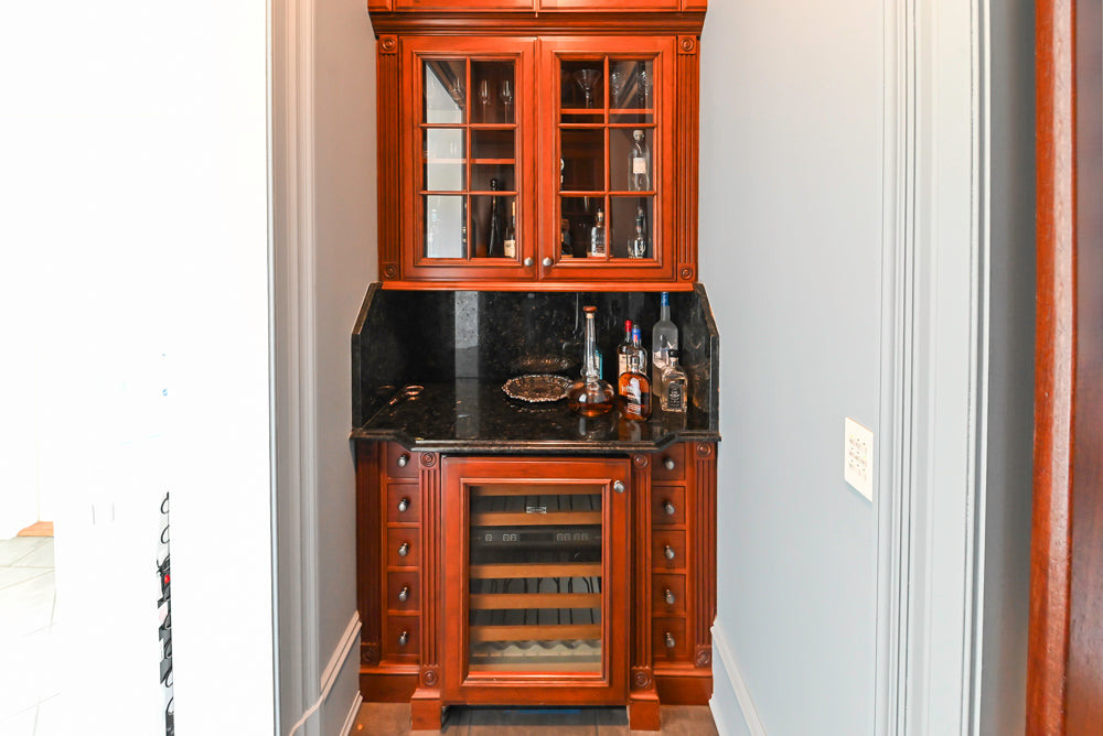 Wood-Mode Traditional Wet Bar with Dark Granite Countertops & Sub-Zero Wine Cooler