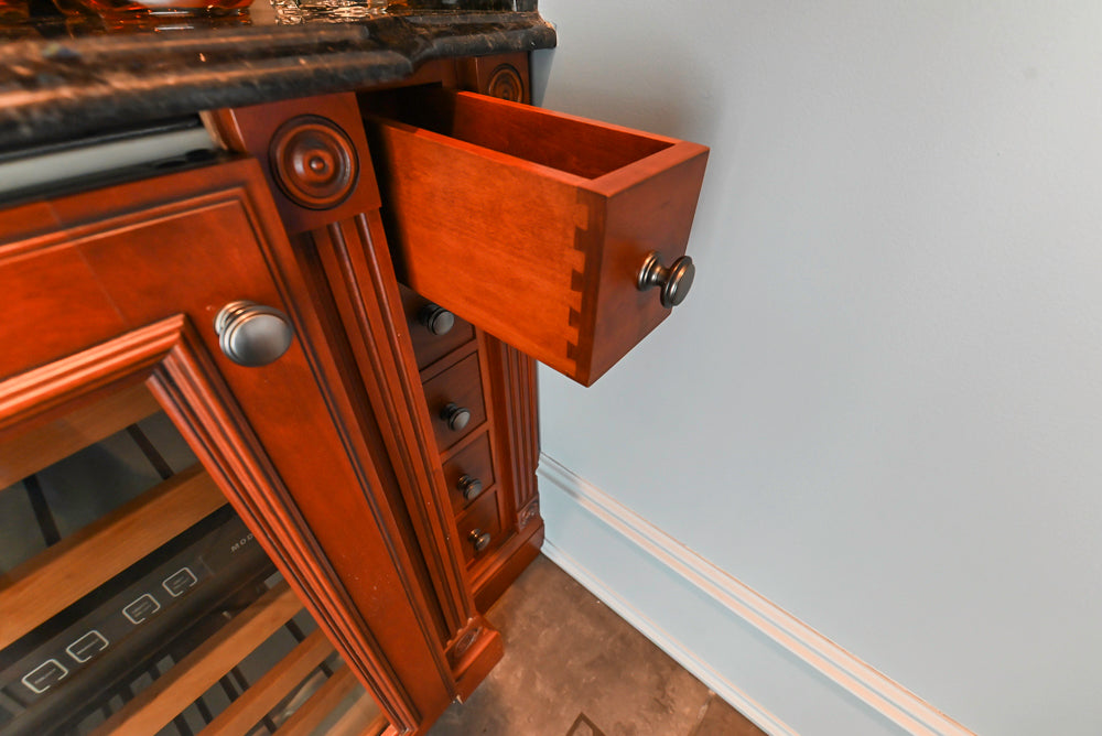Wood-Mode Traditional Wet Bar with Dark Granite Countertops & Sub-Zero Wine Cooler