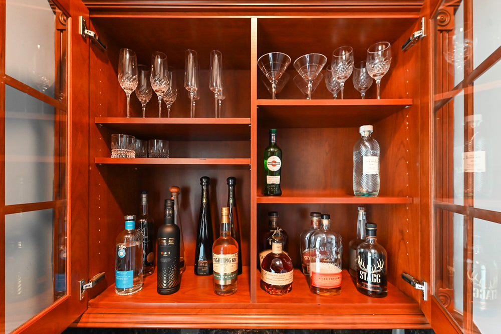 Wood-Mode Traditional Wet Bar with Dark Granite Countertops & Sub-Zero Wine Cooler