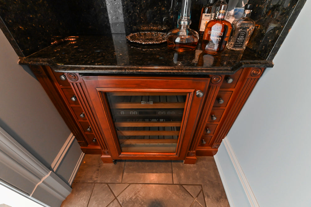 Wood-Mode Traditional Wet Bar with Dark Granite Countertops & Sub-Zero Wine Cooler