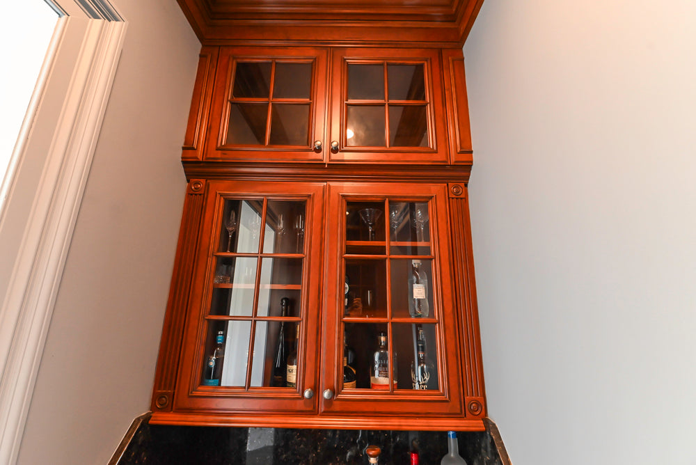 Wood-Mode Traditional Wet Bar with Dark Granite Countertops & Sub-Zero Wine Cooler