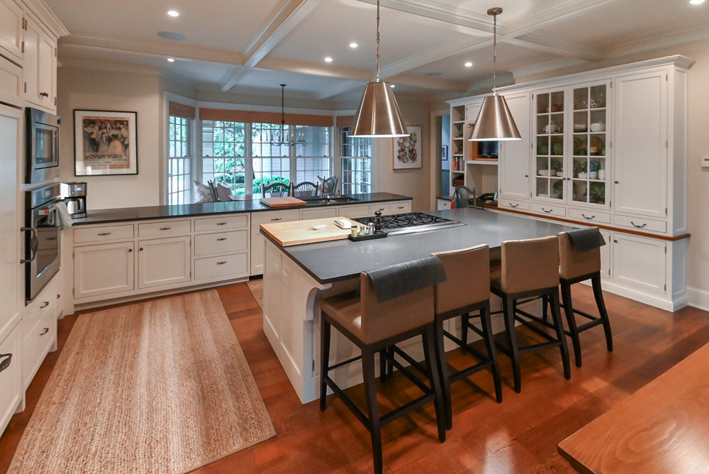 Large Traditional White Kitchen with Island, Stone Countertops & Desk Area