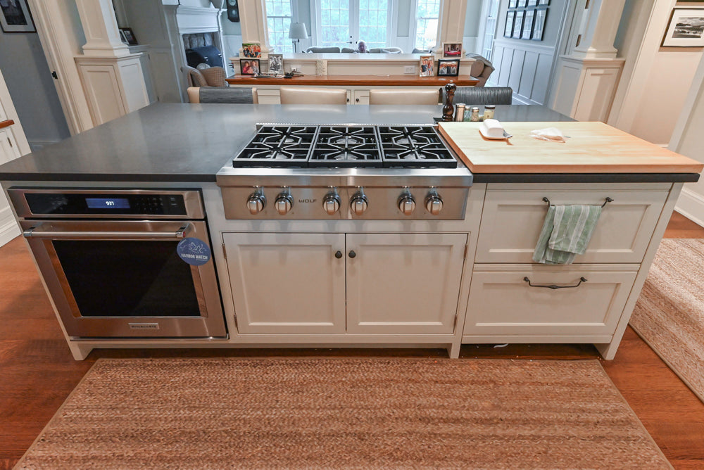 Large Traditional White Kitchen with Island, Stone Countertops & Desk Area