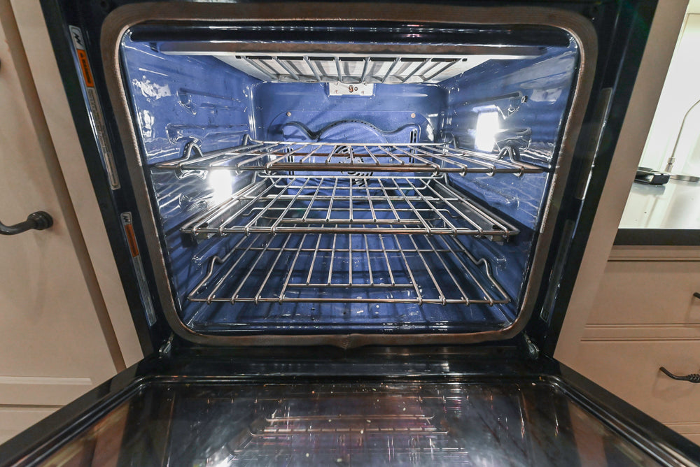 Large Traditional White Kitchen with Island, Stone Countertops & Desk Area