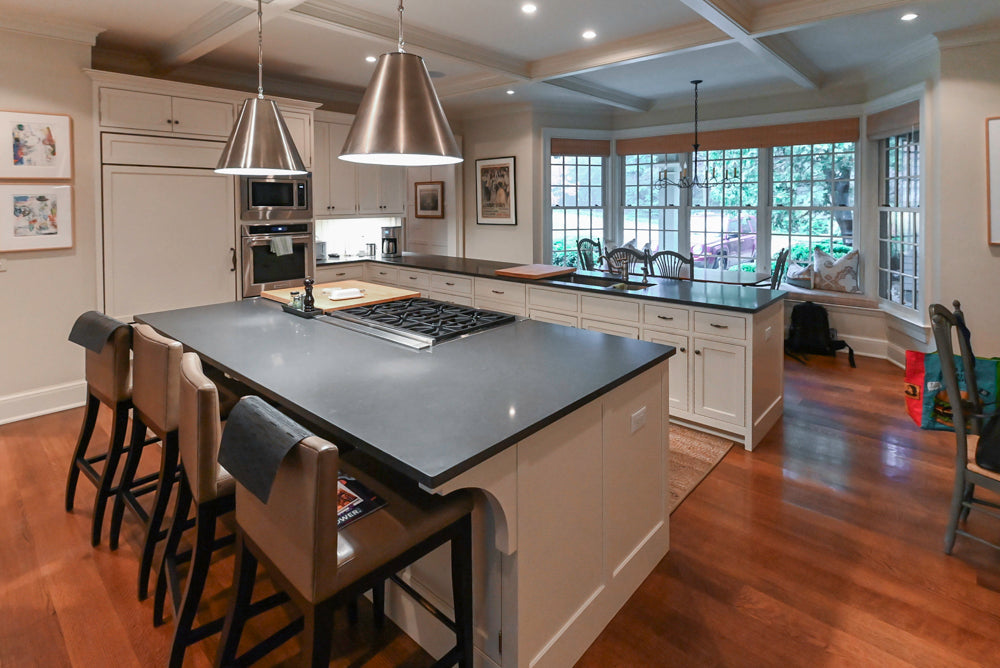 Large Traditional White Kitchen with Island, Stone Countertops & Desk Area