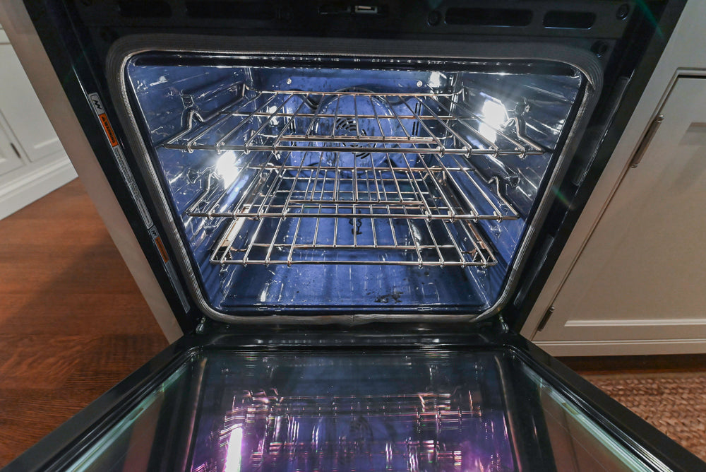 Large Traditional White Kitchen with Island, Stone Countertops & Desk Area
