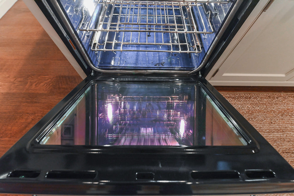 Large Traditional White Kitchen with Island, Stone Countertops & Desk Area