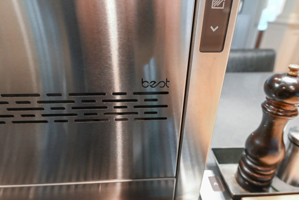Large Traditional White Kitchen with Island, Stone Countertops & Desk Area