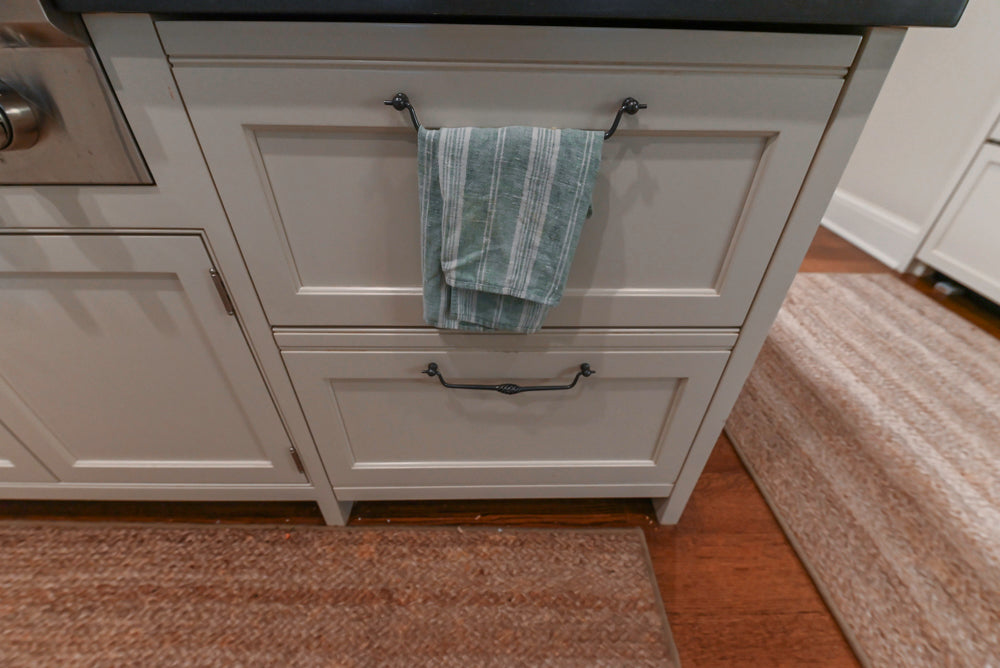 Large Traditional White Kitchen with Island, Stone Countertops & Desk Area
