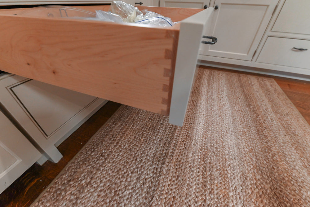 Large Traditional White Kitchen with Island, Stone Countertops & Desk Area