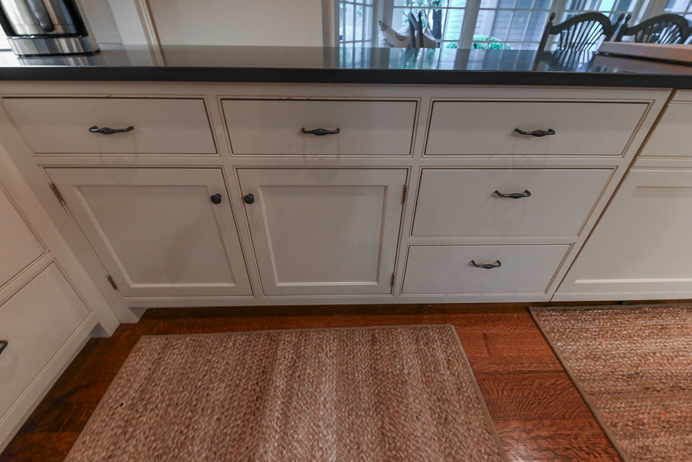 Large Traditional White Kitchen with Island, Stone Countertops & Desk Area