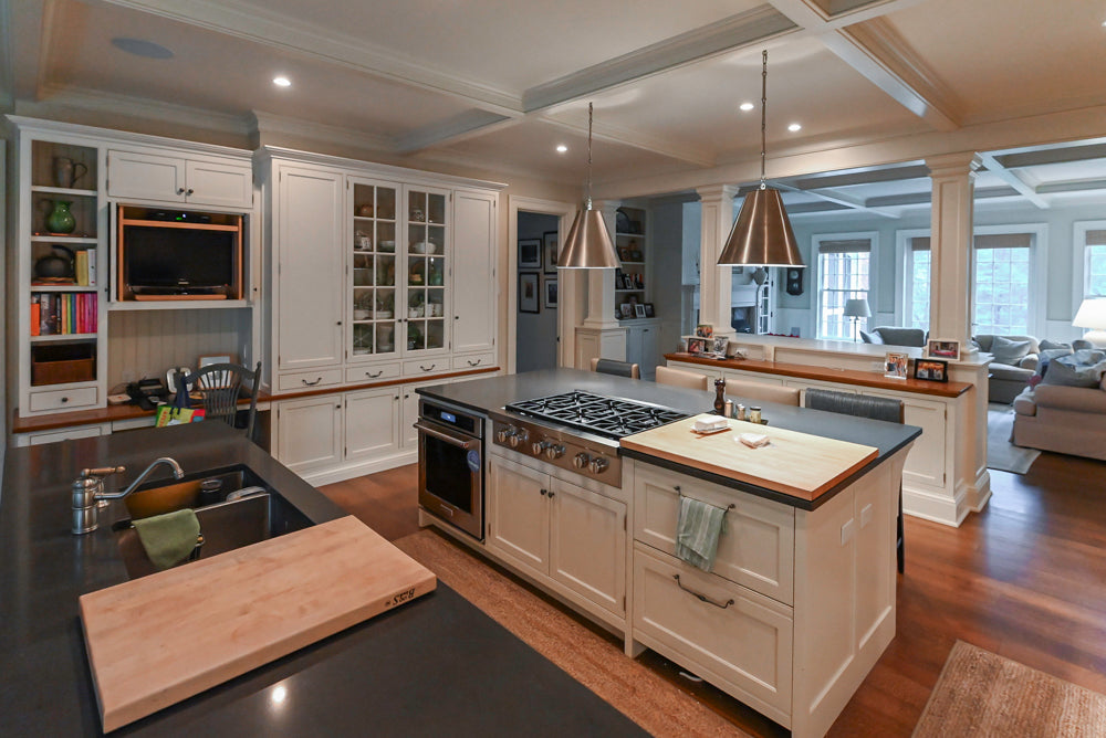 Large Traditional White Kitchen with Island, Stone Countertops & Desk Area