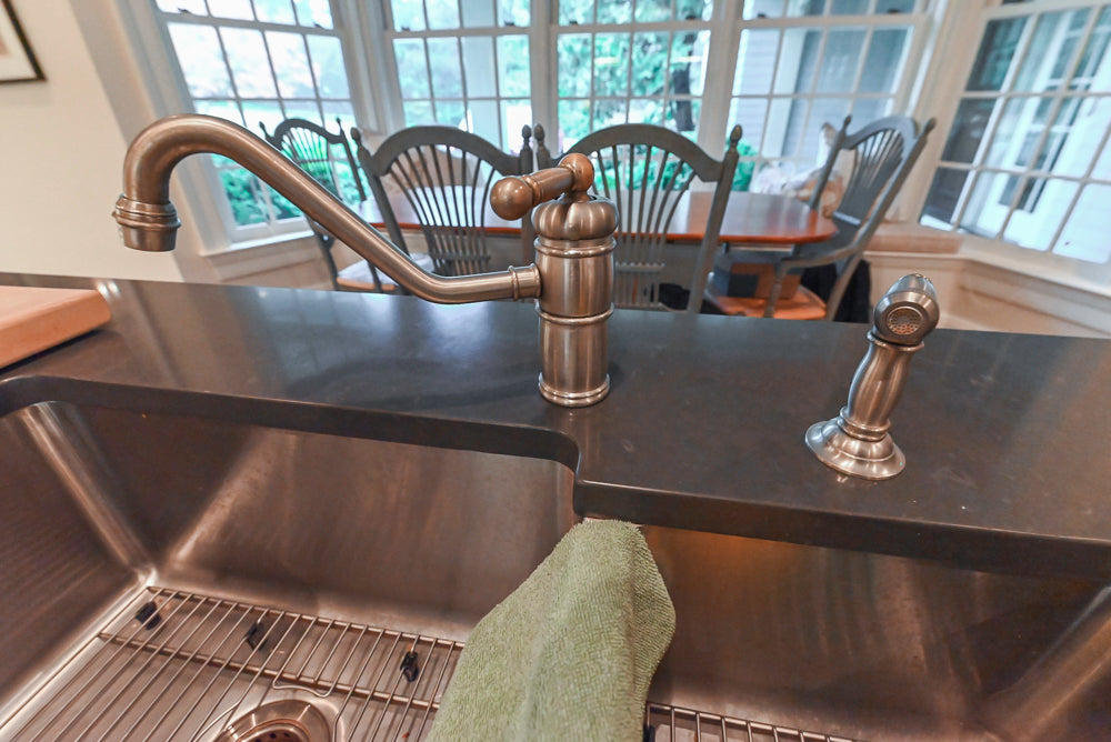 Large Traditional White Kitchen with Island, Stone Countertops & Desk Area
