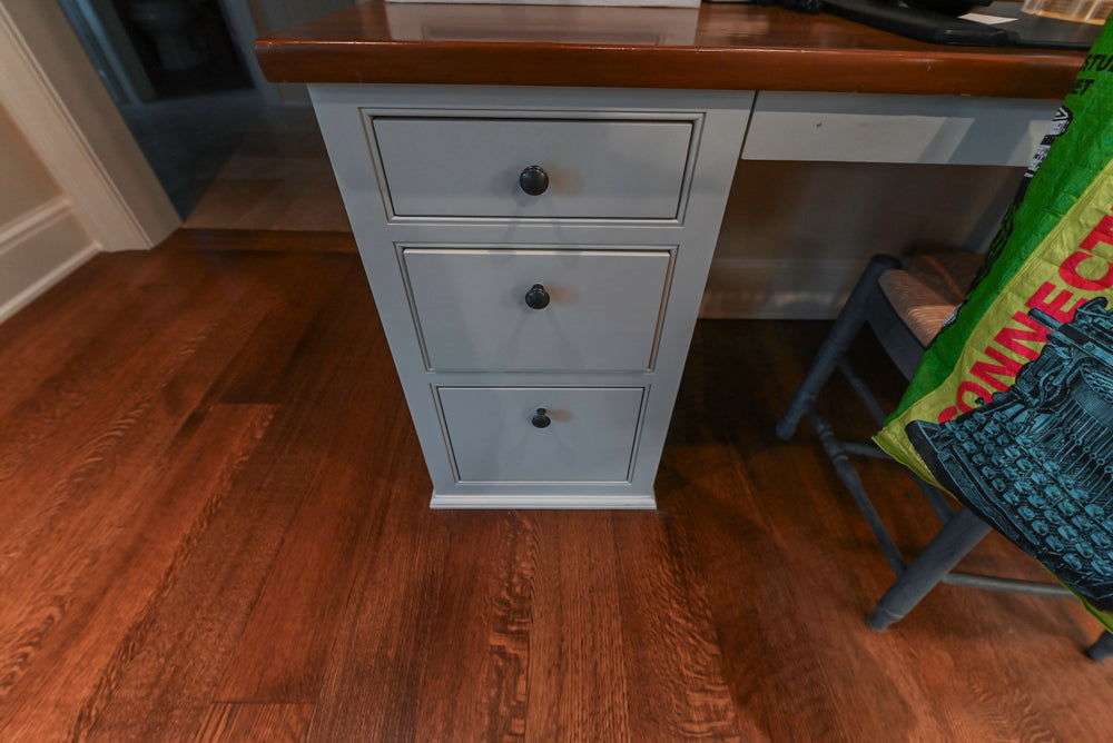 Large Traditional White Kitchen with Island, Stone Countertops & Desk Area