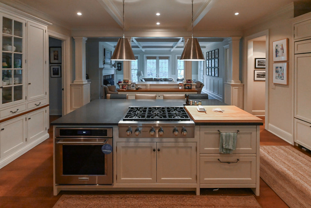Large Traditional White Kitchen with Island, Stone Countertops & Desk Area
