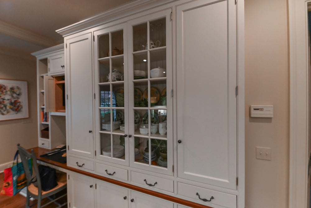 Large Traditional White Kitchen with Island, Stone Countertops & Desk Area