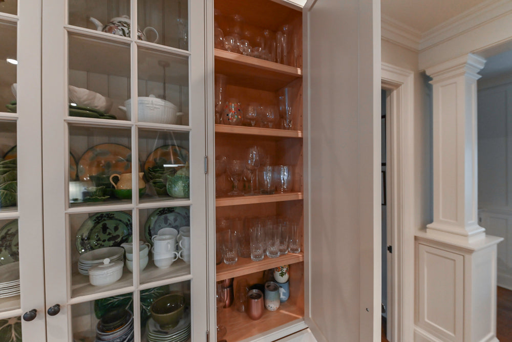 Large Traditional White Kitchen with Island, Stone Countertops & Desk Area