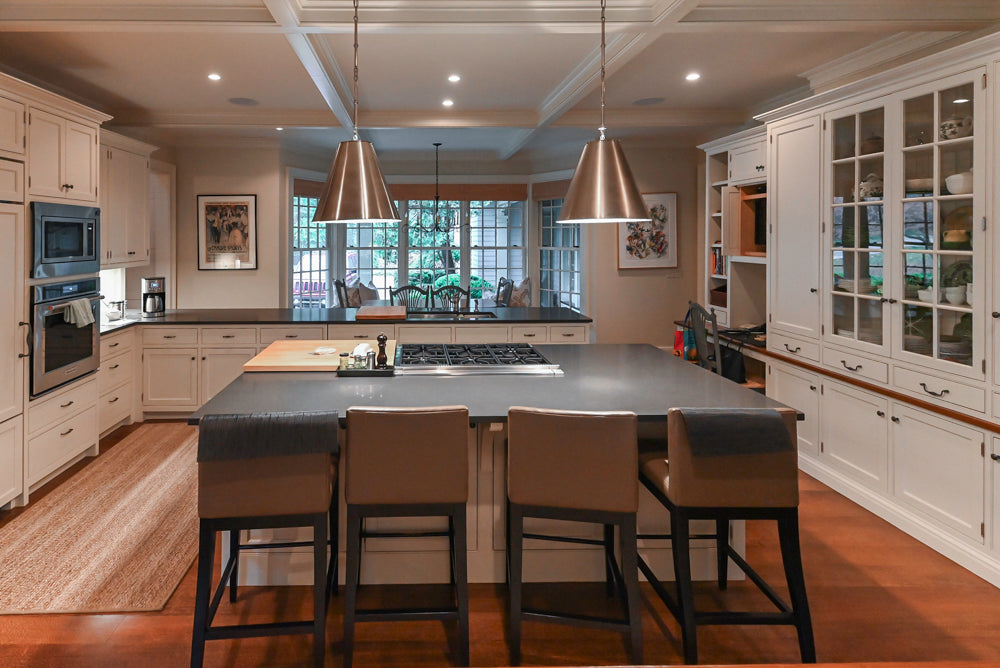 Large Traditional White Kitchen with Island, Stone Countertops & Desk Area