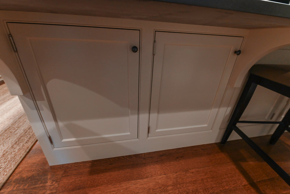 Large Traditional White Kitchen with Island, Stone Countertops & Desk Area