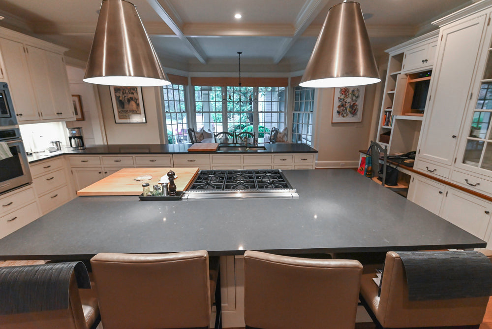 Large Traditional White Kitchen with Island, Stone Countertops & Desk Area