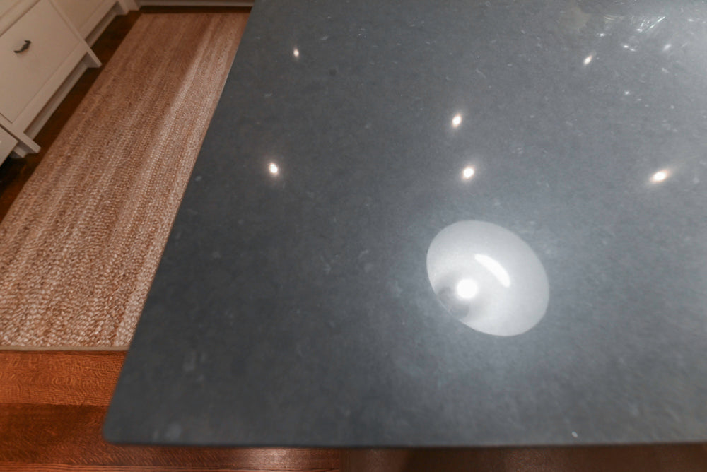 Large Traditional White Kitchen with Island, Stone Countertops & Desk Area