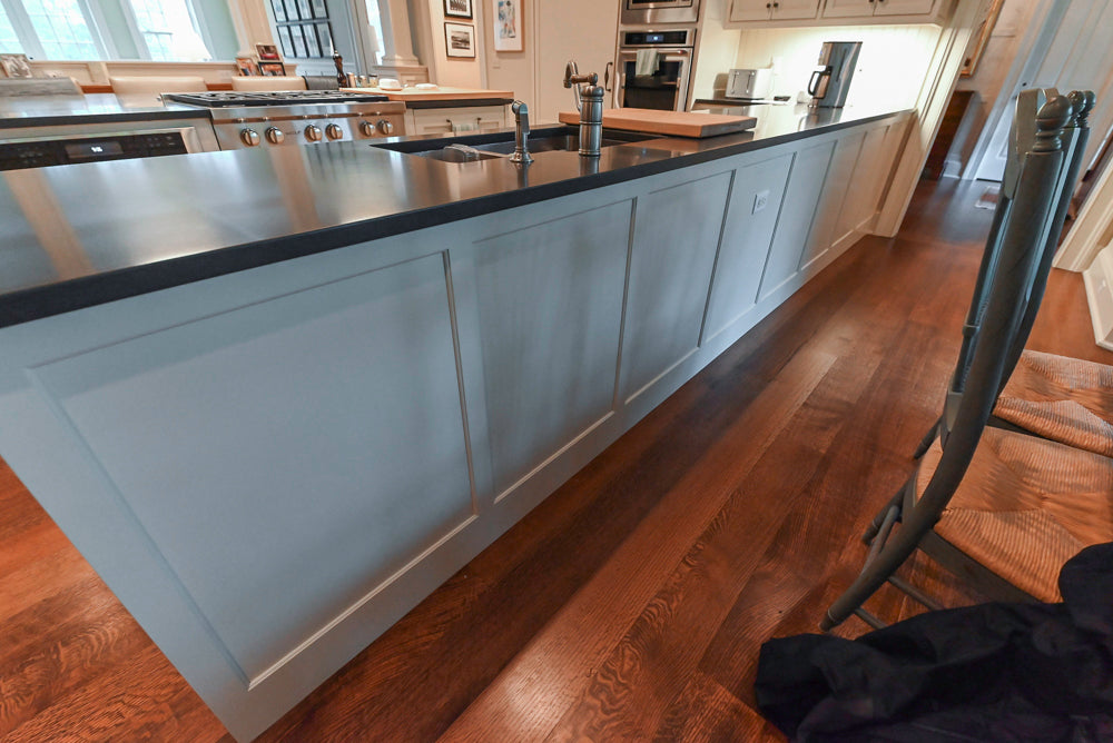 Large Traditional White Kitchen with Island, Stone Countertops & Desk Area