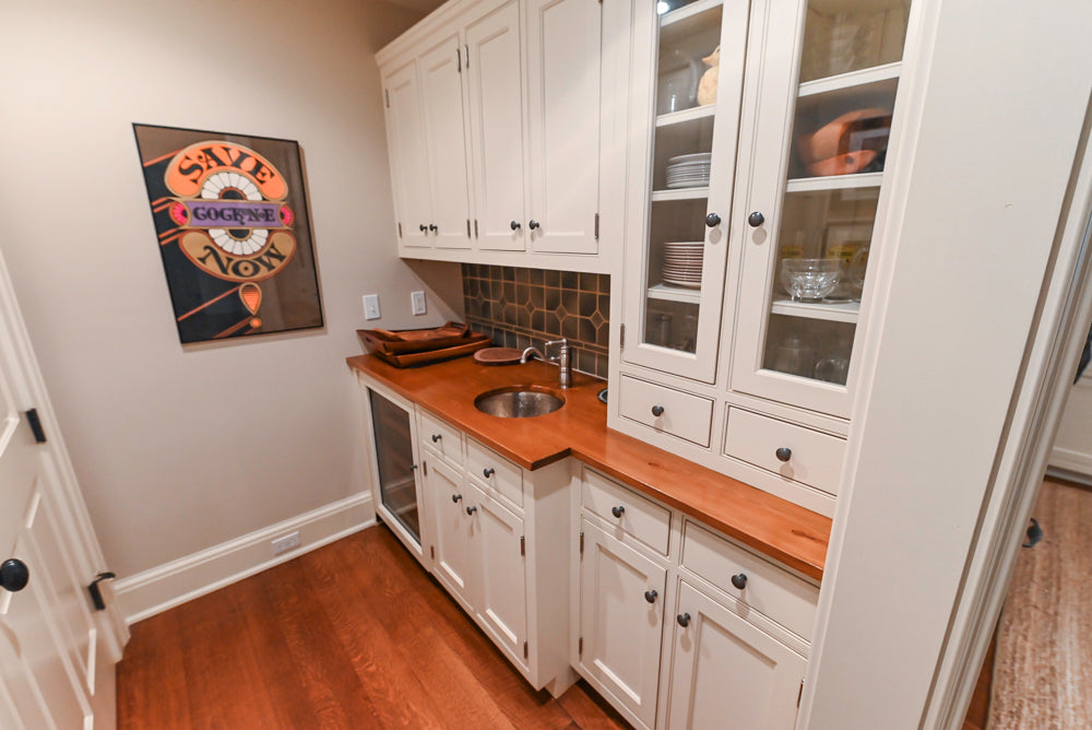 Traditional White Butler's Pantry with Prep Sink and Wood Countertops