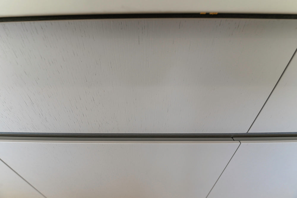 Large White Modern Kitchen with Island and Quartz Countertops