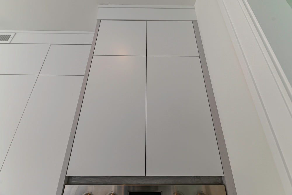 Large White Modern Kitchen with Island and Quartz Countertops