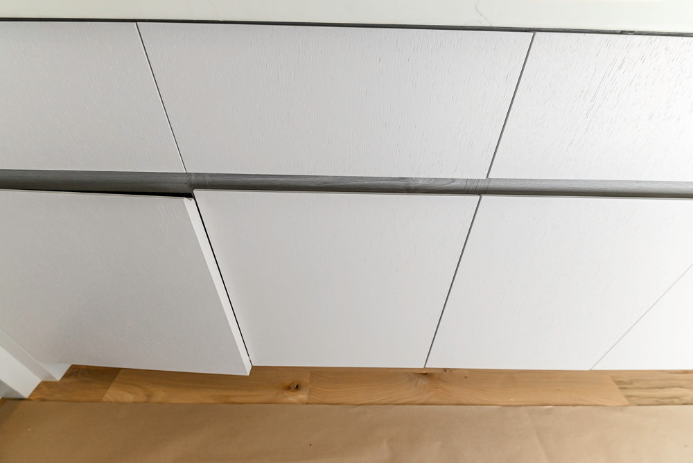 Large White Modern Kitchen with Island and Quartz Countertops