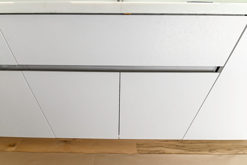 Large White Modern Kitchen with Island and Quartz Countertops