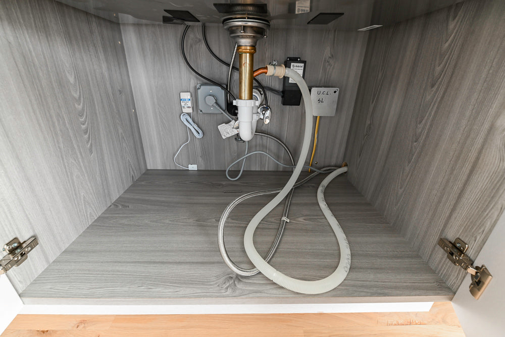 Large White Modern Kitchen with Island and Quartz Countertops