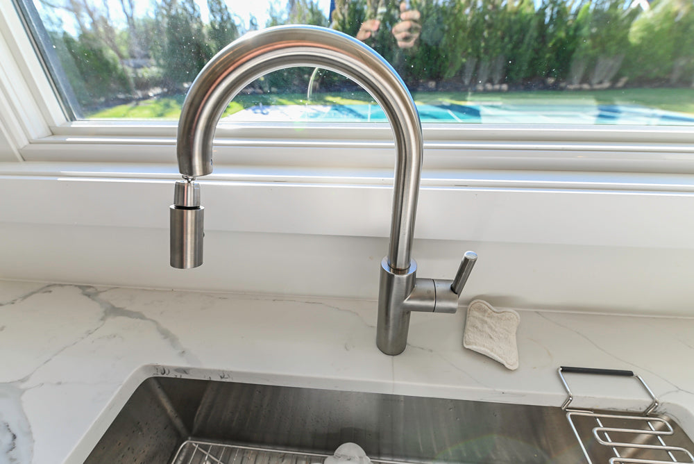 Large White Modern Kitchen with Island and Quartz Countertops