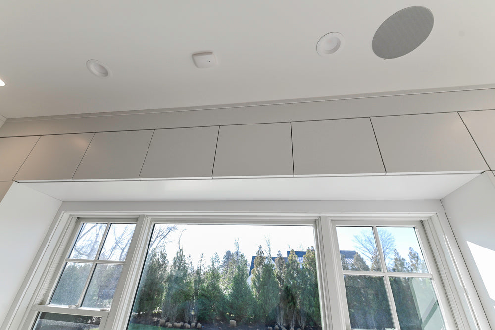 Large White Modern Kitchen with Island and Quartz Countertops